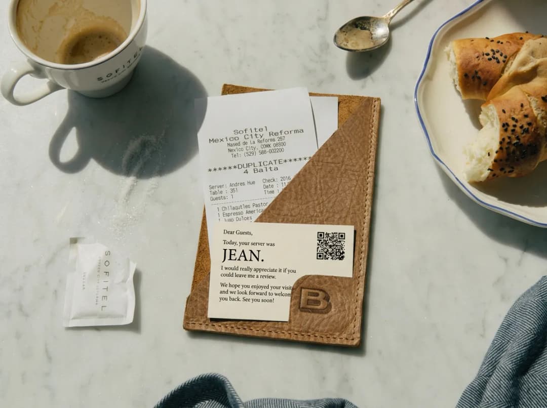 QR insert in a leather check presenter